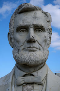 Low angle view of statue against sky