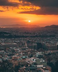 High angle view of townscape against sky during sunset