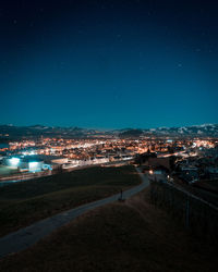 High angle view of townscape against sky at night