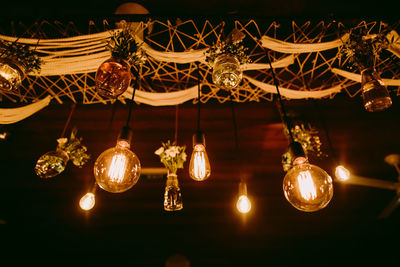 Low angle view of illuminated chandelier