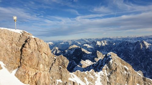 Scenic view of snowcapped mountains against sky