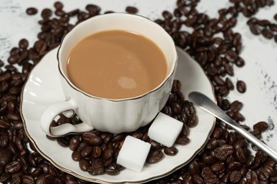 Close-up of coffee cup on table