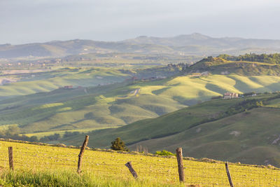 Rolling italian countryside with fields and valleys