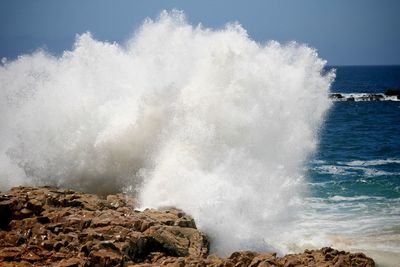 Waves splashing on rocks