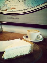 Close-up of coffee cup on table