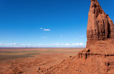 View of desert against cloudy sky