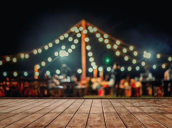 Defocused image of illuminated lights at night