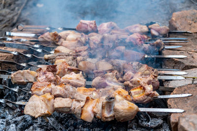 Close-up of meat on barbecue grill