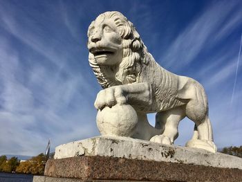 Low angle view of statue against sky