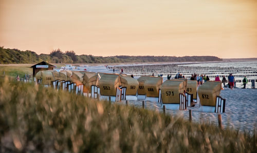 Scenic view of beach against sky during sunset