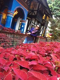 Woman standing outside building