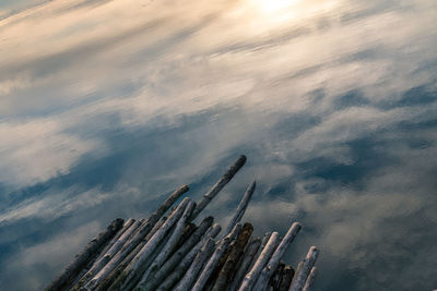 High angle view of wooden post against sky