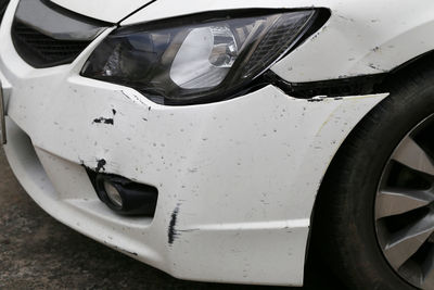 Close-up of car on street