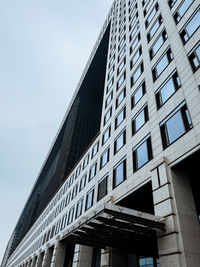 Low angle view of modern building against sky