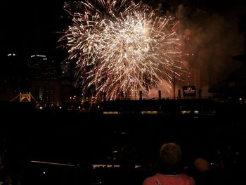 Firework display at night