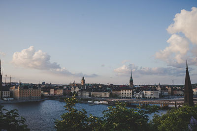 View of city against cloudy sky