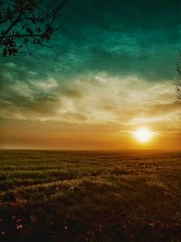 Scenic view of landscape against sky during sunset