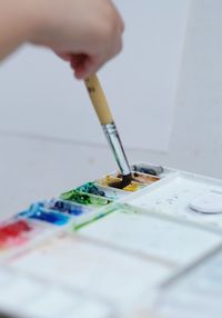 Midsection of person working in container