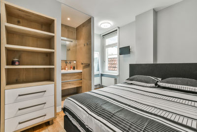 Interior of modern bedroom in apartment