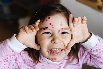 Portrait of a smiling girl looking at camera