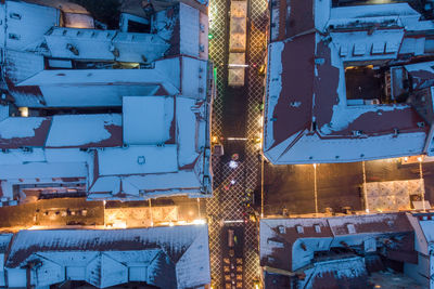 Illuminated buildings in city at night