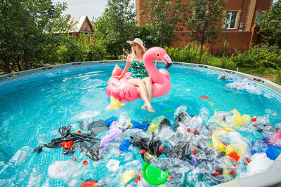 High angle view of man swimming in pool