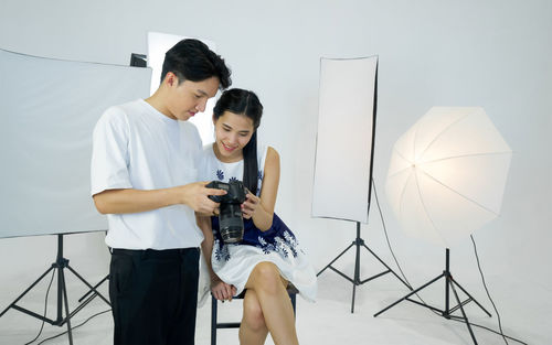 Young couple photographing
