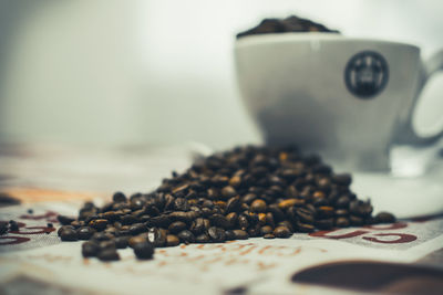 Close-up of coffee beans on table