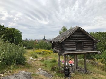 View of built structure on landscape against sky