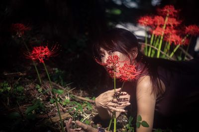 Portrait of girl holding flowers