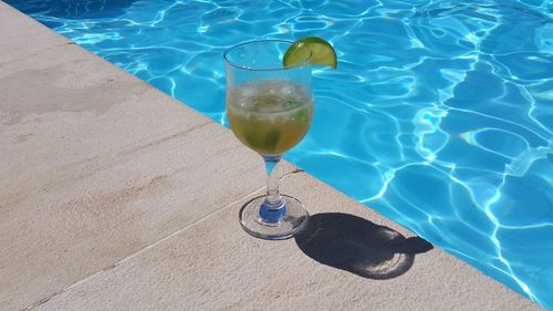 High angle view of drink in swimming pool