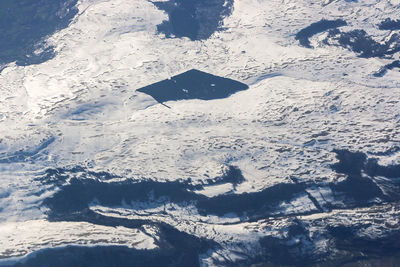 High angle view of snow covered land