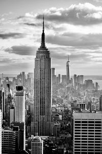 Buildings in city against sky