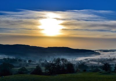 Scenic view of landscape during sunset