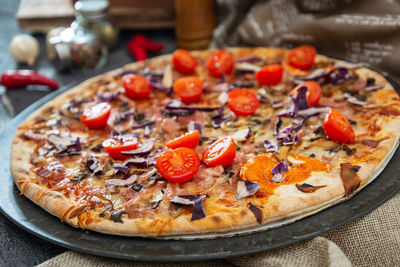 Close-up of pizza served in plate