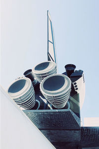 Low angle view of metallic structure against clear sky