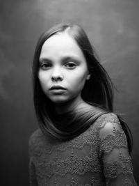 Close-up portrait of serious young woman