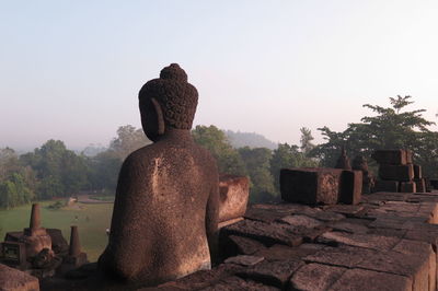 Statue of buddha against clear sky