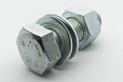 High angle view of old metal against white background