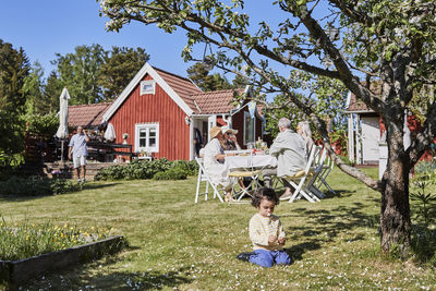 Toddler playing in garden