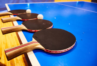 Close-up of sports equipment on table tennis