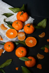 High angle view of orange fruits on table