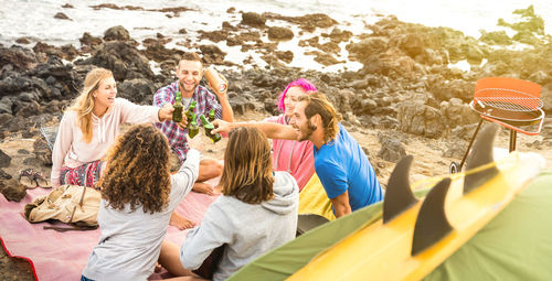 Cheerful of friends enjoying at sea