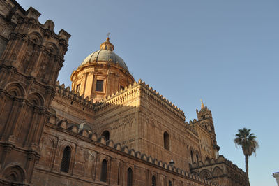 Low angle view of historic building against clear sky