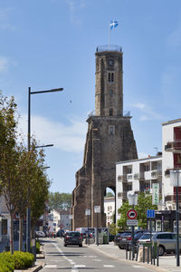 Calais, france - june 22 2020 - the tour du guet is a 13th-century watchtower on place d'armes.