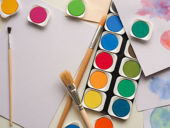 High angle view of paintbrushes on table