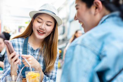 Young woman holding ice cream