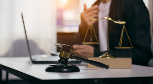 Close-up of hand holding candle