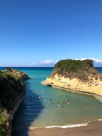 Scenic view of sea against clear blue sky