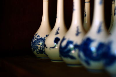 Ceramic alcohol bottles on table